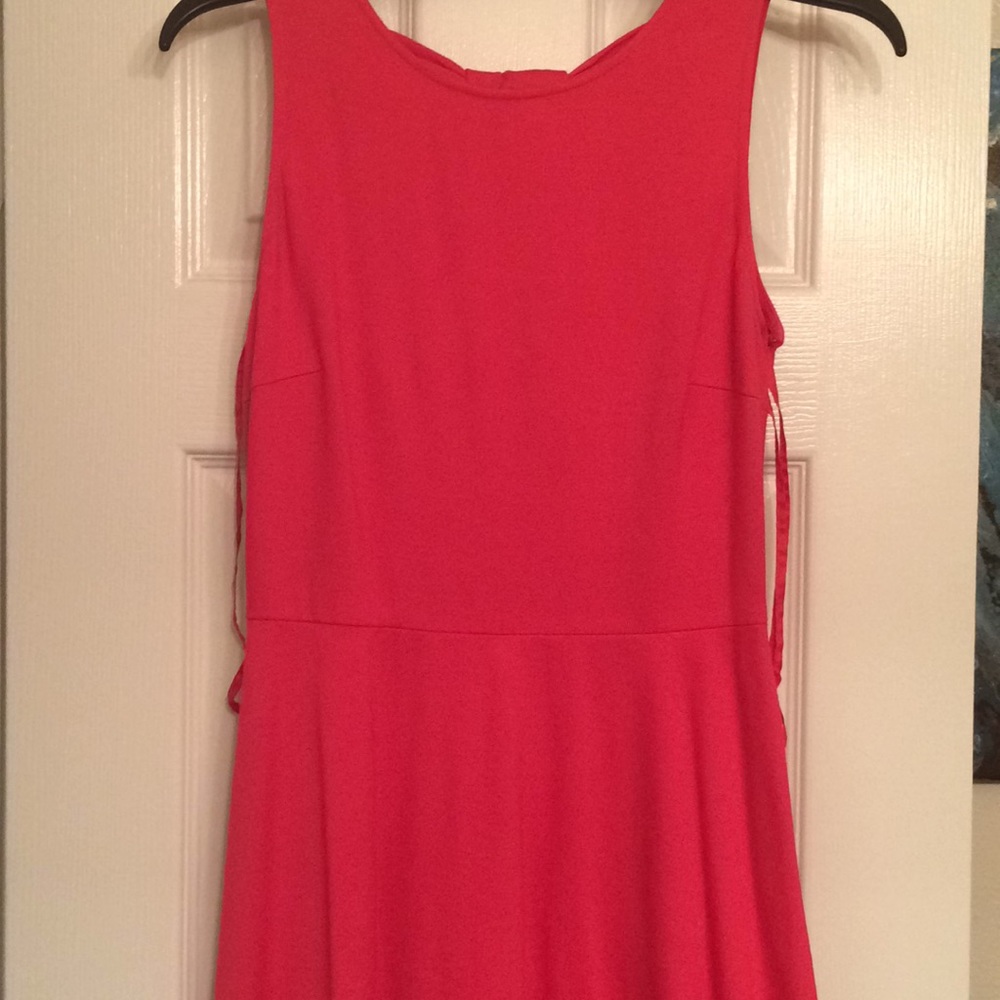 Mid thigh length dress with 3 knots down back